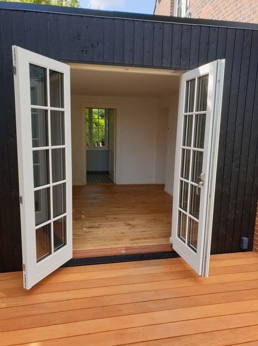 Tilbygning til hus